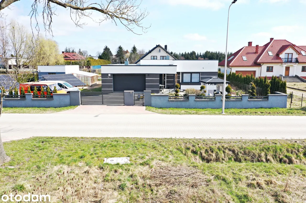 Nowoczesny dom parterowy z garażem, 176 m² — zdjęcie 2 z 12